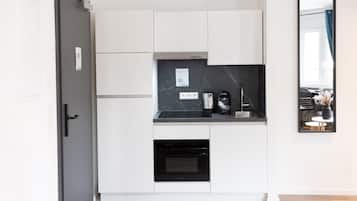 Comfort Suite Apartment | Cocina privada | Frigorífico grande, horno, placa de cocina y lavavajillas