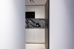 Comfort Apartment | Private kitchen | Full-size fridge, oven, stovetop, dishwasher