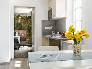 Microwave, highchair, dining tables