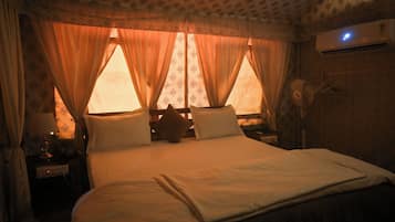 Deluxe Tent | Premium bedding, down duvets, memory-foam beds, desk