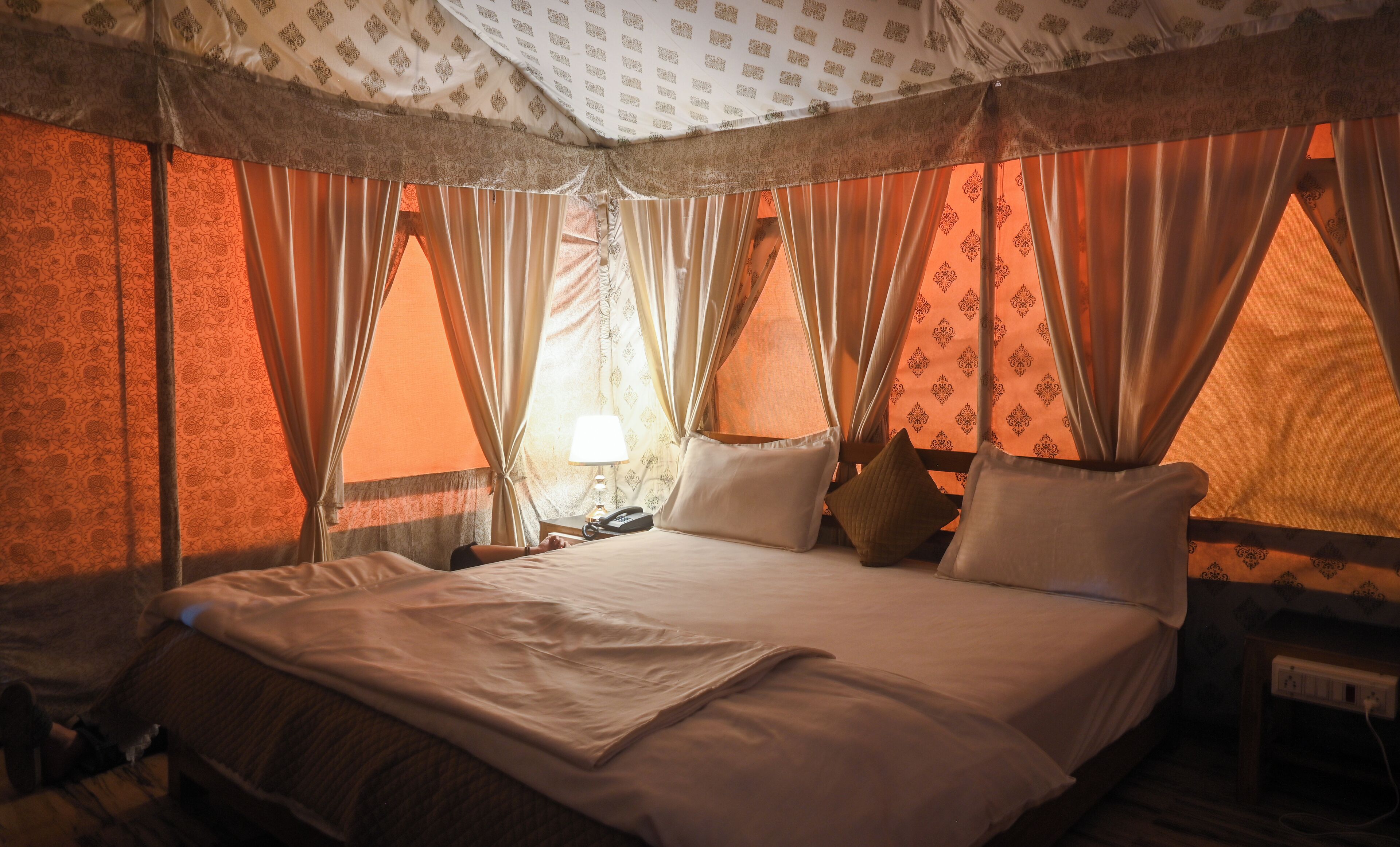 Deluxe Tent | Premium bedding, down duvets, memory-foam beds, desk