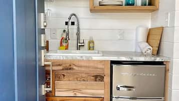 Microwave, stovetop, coffee/tea maker, cookware/dishes/utensils