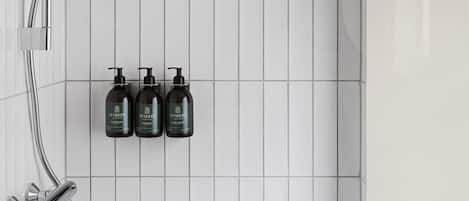 Shower, eco-friendly toiletries, hair dryer, towels