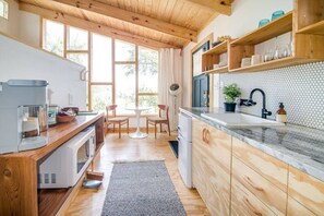 Microwave, stovetop, coffee/tea maker, cookware/dishes/utensils - Sapling Treehouse at HoneyTree (Fredericksburg)