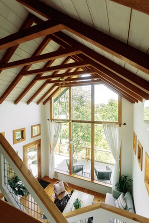 Living area - Sycamore Treehouse at The Meadow by HoneyTree (Fredericksburg)