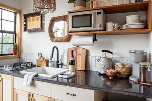 Fridge, microwave, coffee/tea maker, toaster