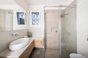 Hair dryer, towels, soap, shampoo