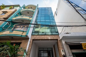 Stunning multi-story building with a unique blend of traditional and contemporary elements.