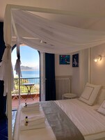 Deluxe Room | Hypo-allergenic bedding, down comforters, individually decorated