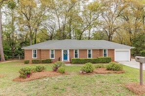 Exterior - 4 bedroom, 2 bathroom home with partially fenced backyard that allows pets. The sleeping arrangements for this property are 4 queen beds. (Augusta)