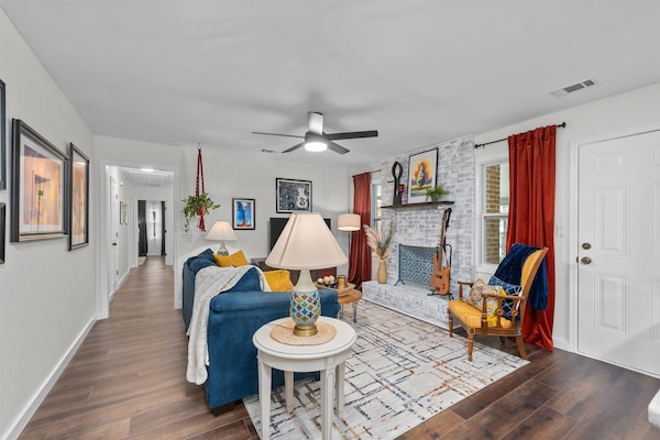 View of the living room with comfortable seating and Smart Tv