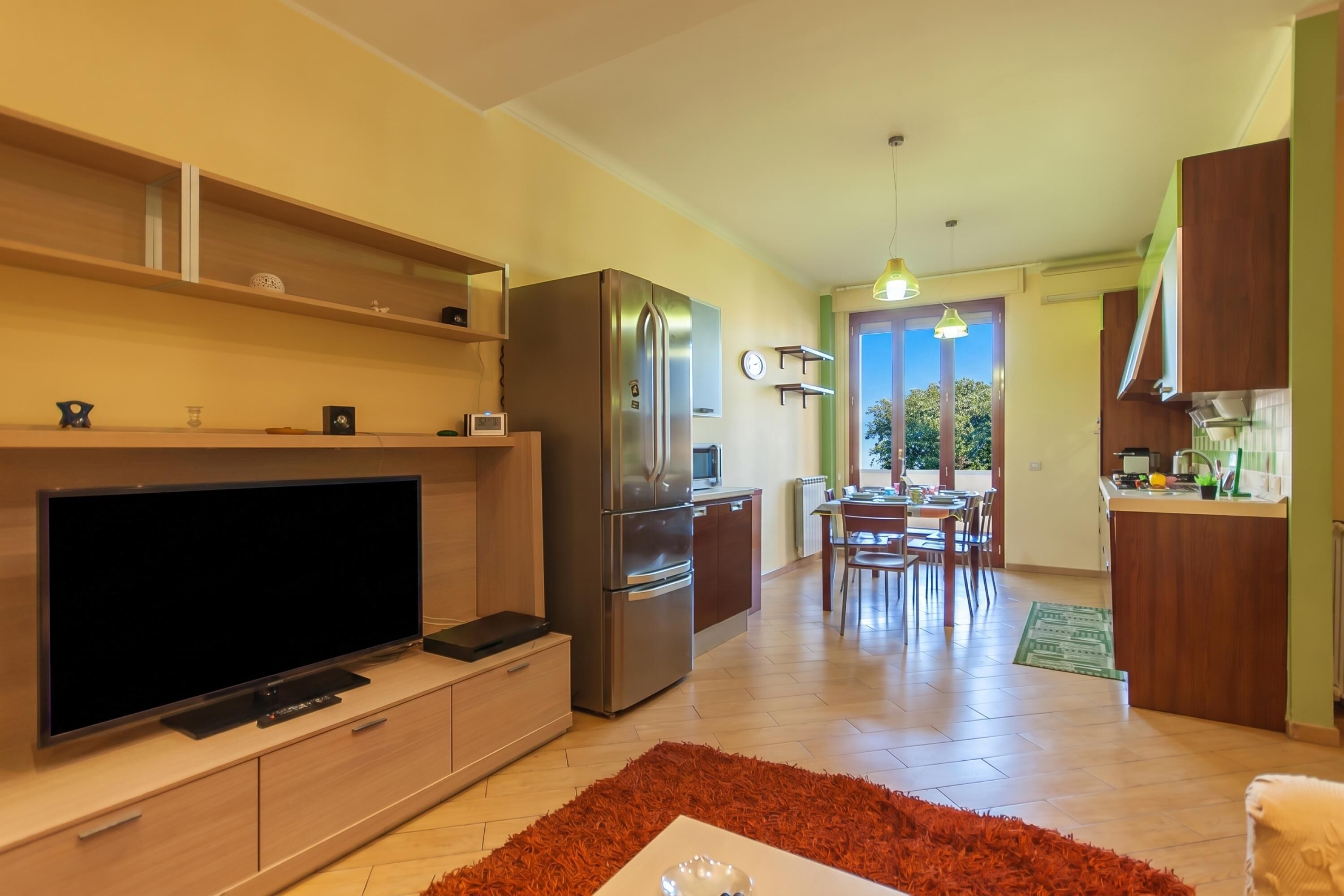 Appartamento familiare, camere multiple (Happy Apartment Nettuno Close To Sea) | Soggiorno | TV a schermo piatto 21 pollici con canali via cavo