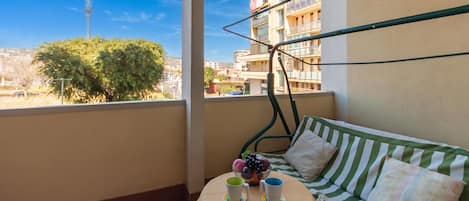 Family Apartment, Multiple Bedrooms (Happy Apartment Nettuno Close To Sea) | Balcony