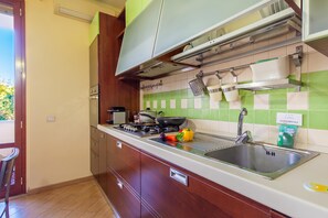 Family Apartment, Multiple Bedrooms (Happy Apartment Nettuno Close To Sea) | Private kitchen