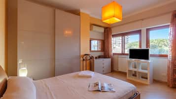 Appartement Familial, plusieurs chambres (Happy Apartment Nettuno Close To Sea) | 2 chambres, espace de travail pour ordinateur portable