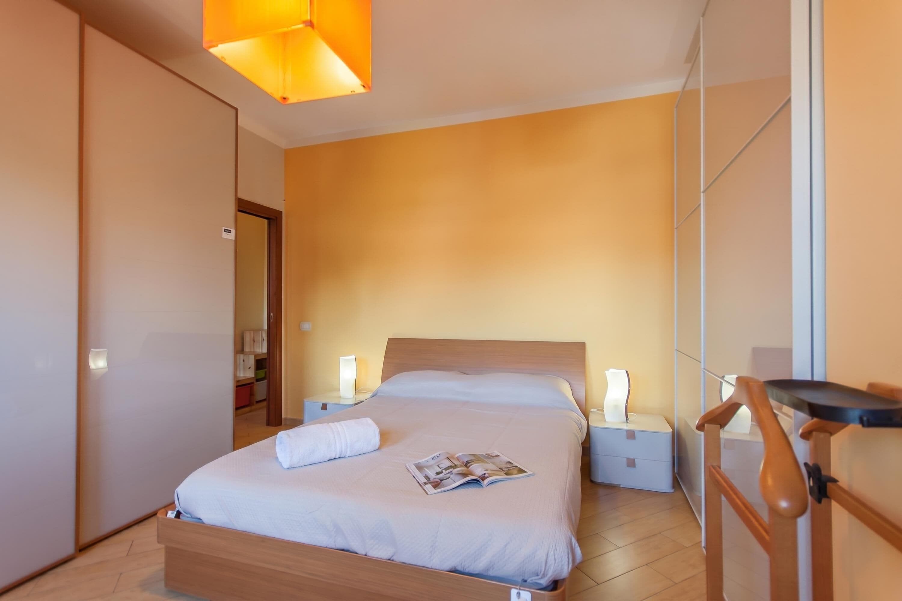 Appartamento familiare, camere multiple (Happy Apartment Nettuno Close To Sea) | 2 camere, postazione laptop, ferro/asse da stiro, lenzuola