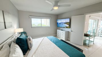 2 habitaciones, tabla de planchar con plancha y cuna de viaje