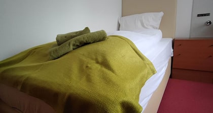 Room in Guest Room - Single Room With Shared Bathroom and Kitchen
