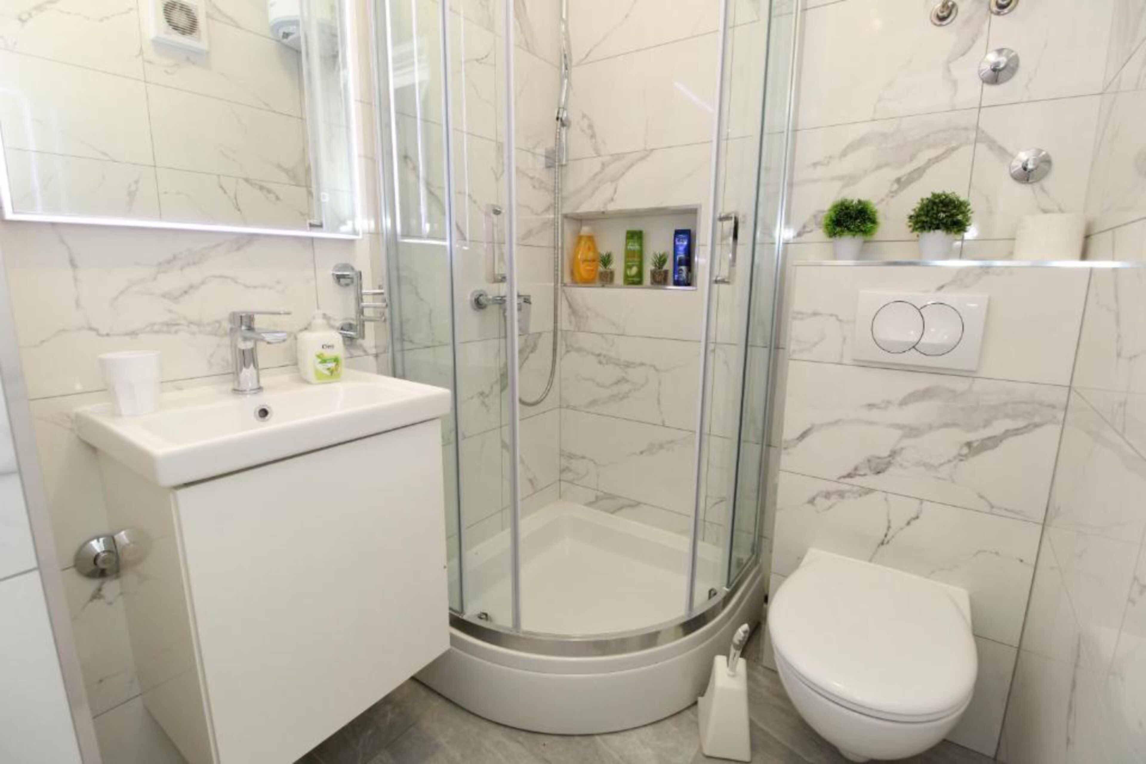 City Apartment, Balcony, Garden View | Bathroom | Shower, hair dryer, towels, soap