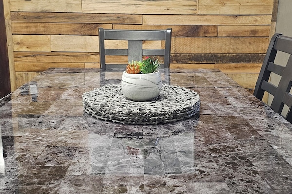 Dining room with rustic wood wall