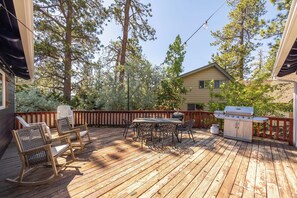 Enjoy al fresco dining on the deck with a barbecue grill and comfortable seating for four.