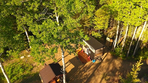 Expérience Tiny House avec SPA privé et accès au fleuve
