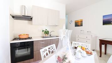 Apartamento, 3 quartos, para fumantes, vista para a cidade | Cozinha privada