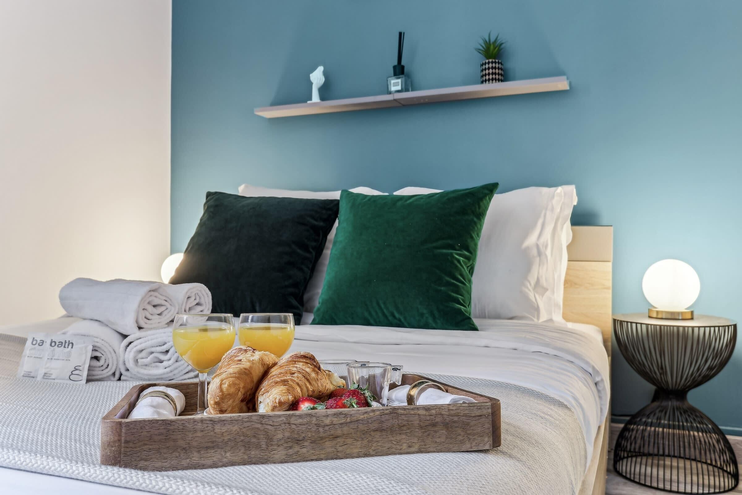 1 bedroom, desk, iron/ironing board, travel crib