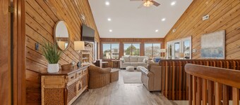 Spacious canal-front home with stunning Back Bay views and sunsets.