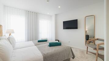 2 habitaciones, tabla de planchar con plancha, wifi y ropa de cama