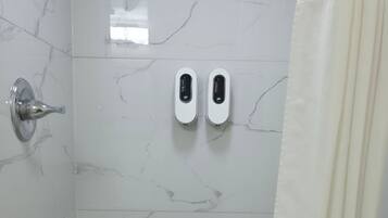 Shower, free toiletries, hair dryer, towels