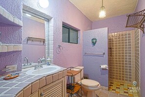 Shower, hair dryer, towels, shampoo