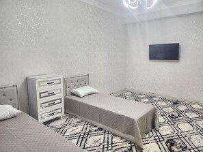 3 bedrooms, free WiFi, bed sheets - New and Stylish Apartment (Tashkent)