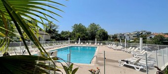 

charming studio in residence with swimming pool by the river and  the sea