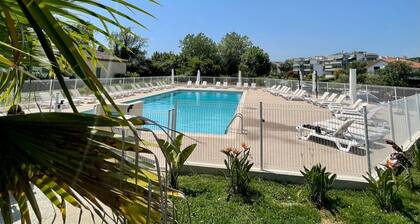 charming studio in residence with swimming pool by the river and the sea