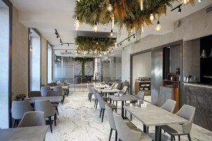 Daily buffet breakfast (USD 13 per person)