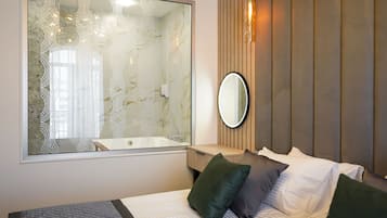 Executive Suite | Premium bedding, minibar, in-room safe, individually decorated