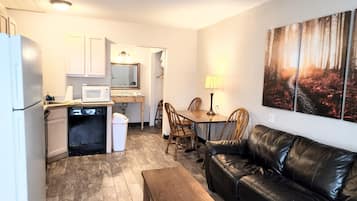 Family Suite | Living area | 40-inch Smart TV with digital channels, streaming services