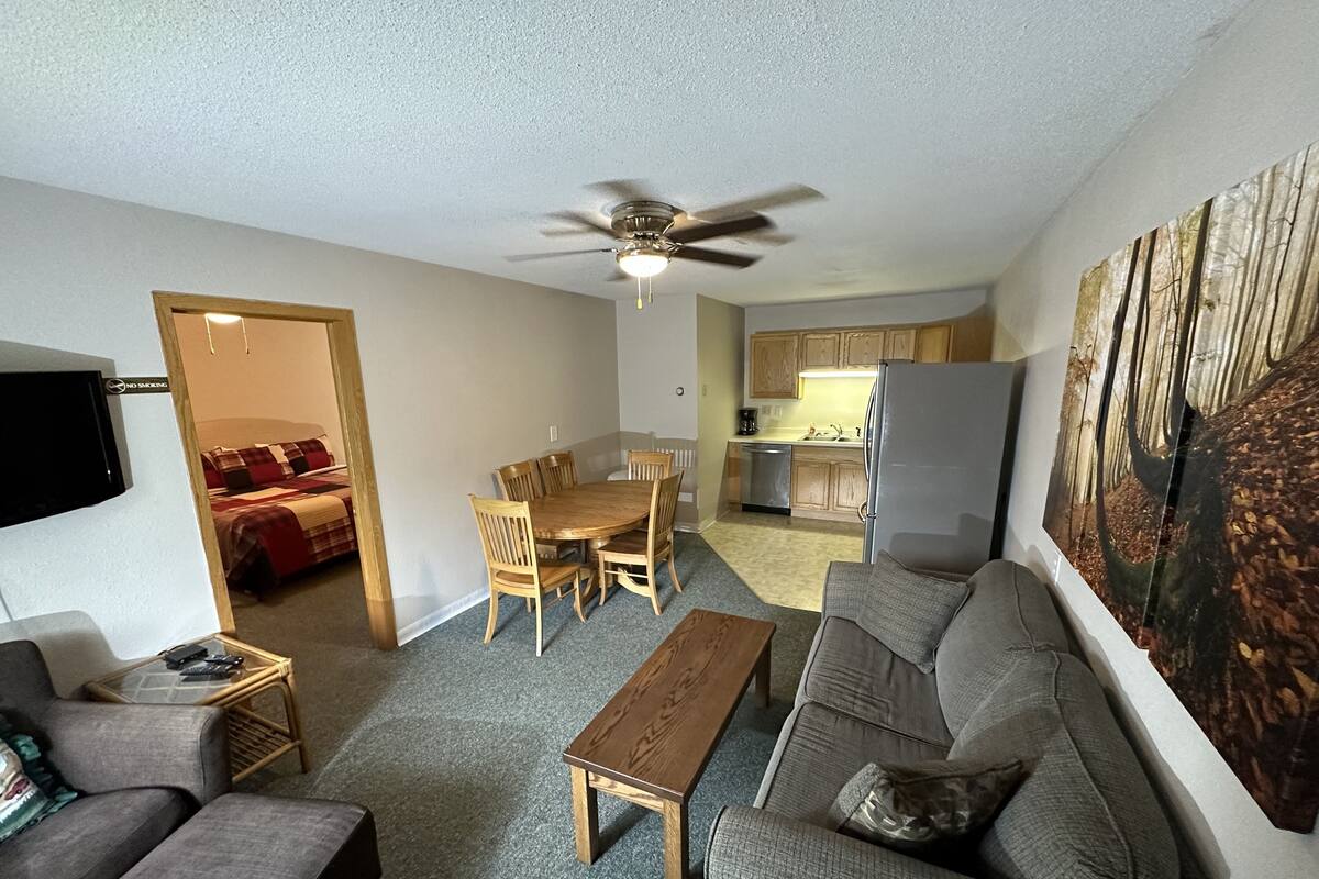 Standard Suite | Living area | 40-inch Smart TV with digital channels, streaming services