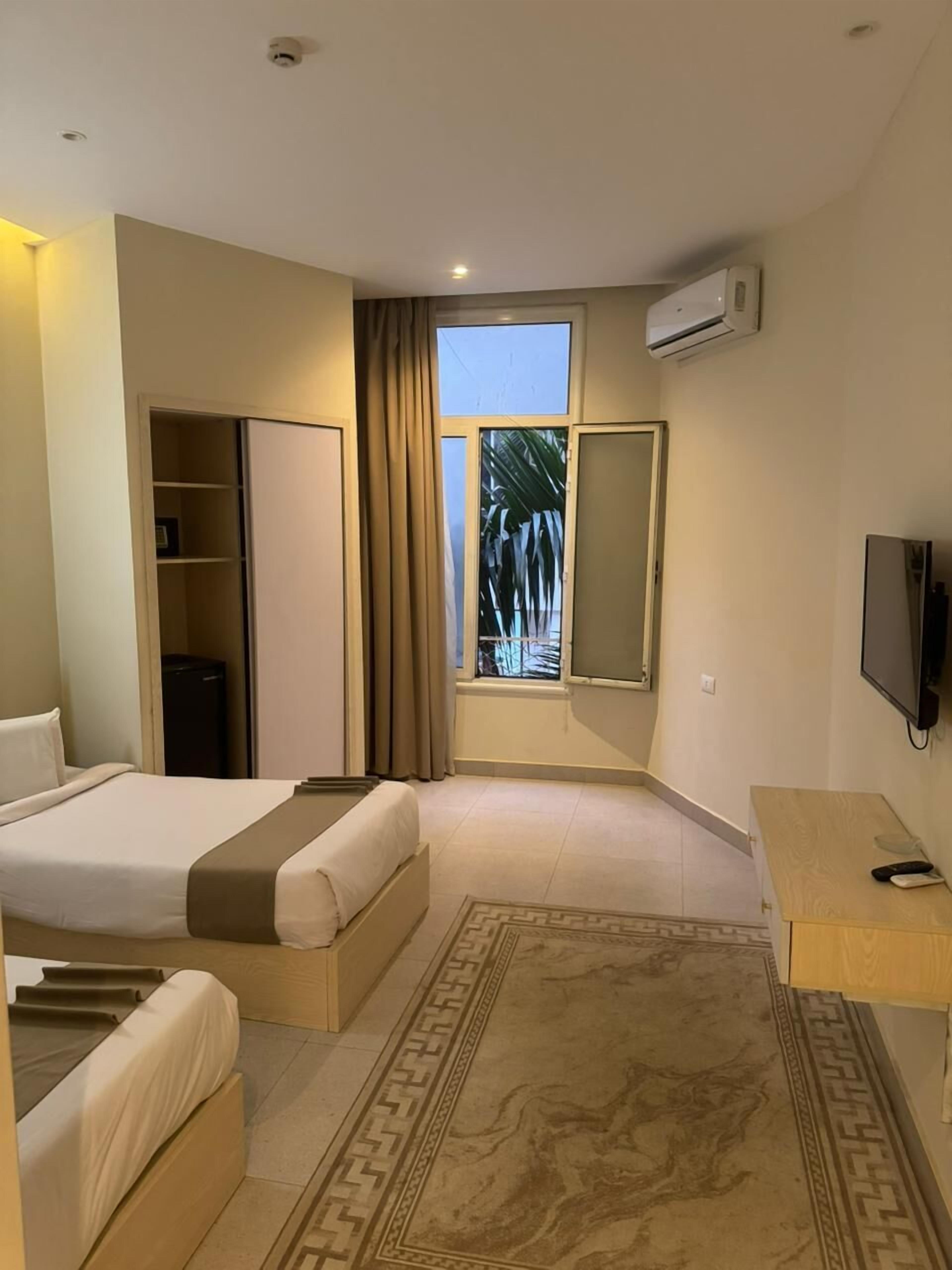 Quarto casal ou duplo superior, vista para a cidade | Roupas de cama de algodão egípcio, roupas de cama premium