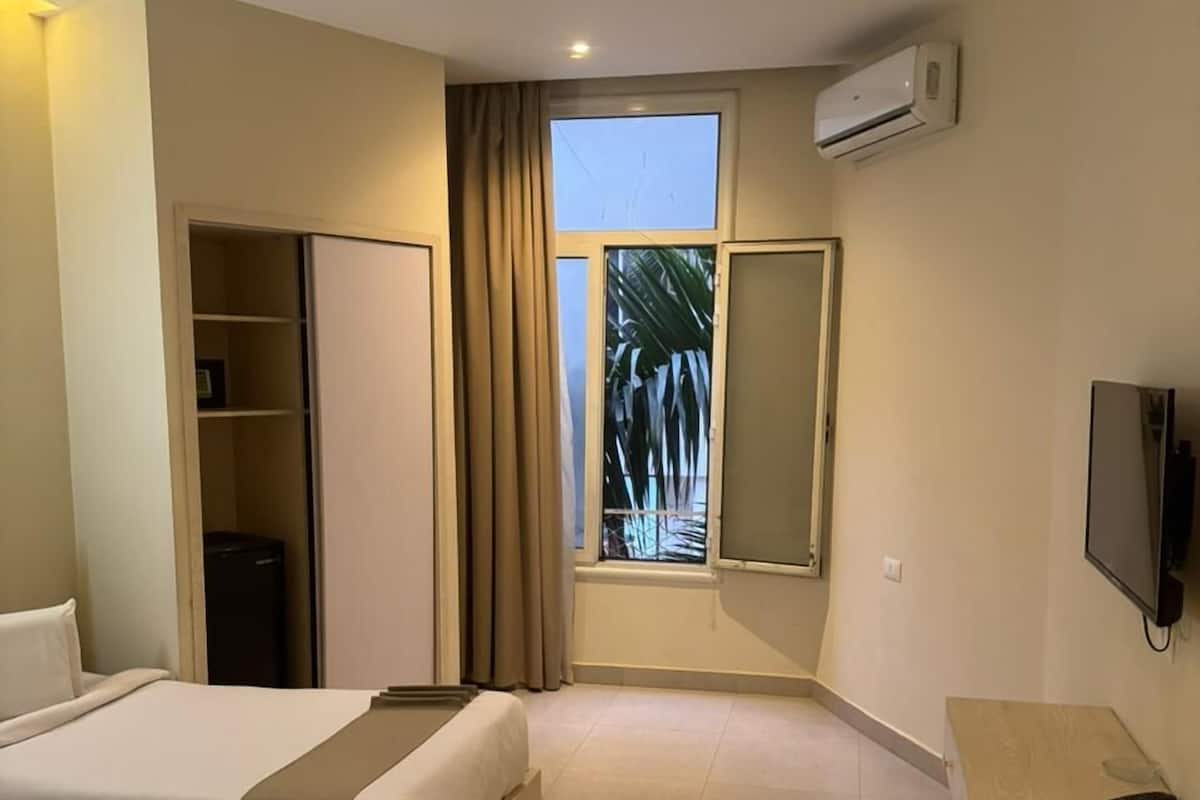 Quarto casal ou duplo superior, vista para a cidade | Roupas de cama de algodão egípcio, roupas de cama premium