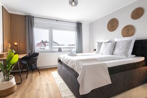 Appartement familial, 2 chambres | Aire de séjour | Téléviseur à écran plat de 43 po avec télévision par câble
