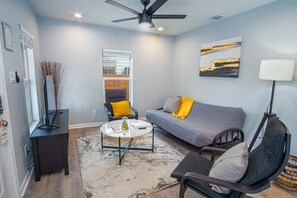House (3 Bedrooms) | Living area | 50-inch TV with digital channels - Charming 3br/1ba Close to Vibrant Downtown (San Antonio)