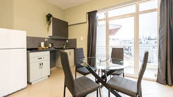 Comfort Apartment | Private kitchen | Espresso maker, coffee/tea maker, cookware/dishes/utensils, freezer