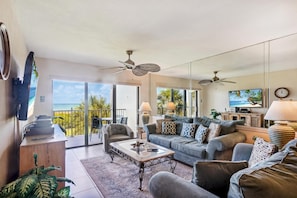 Condo, Multiple Beds (Land's End 8-303 Beach Front) | Living area | TV - Land's End 8-303 Beach Front (Treasure Island)