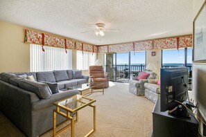 Condo, Multiple Beds (Land's End 8-401 Beach Front) | Living area | TV - Land's End 8-401 Beach Front (Treasure Island)
