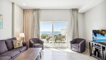 Condo, Multiple Beds (Madeira Bay Resort I 1504) | Living area | TV