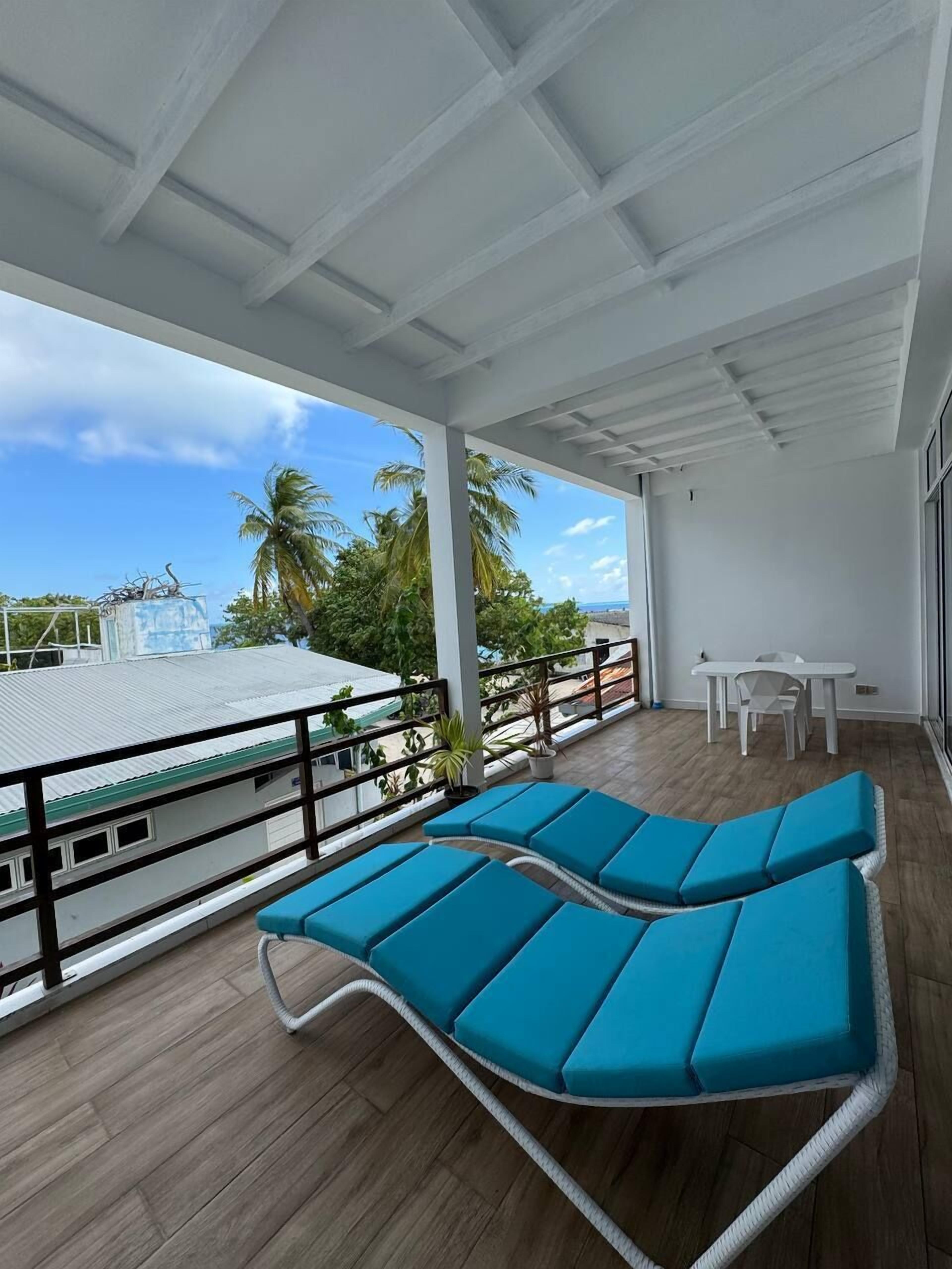 Deluxe-herbergi fyrir þrjá | Stofa