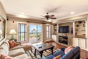 TV, fireplace - Luxury oceanfront condo with community indoor & outdoor pools, hot tub & more (Kill Devil Hills)