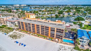 A hotel with a pool, beach, and marina. - Villa Madeira 301 - Premier (Madeira Beach)